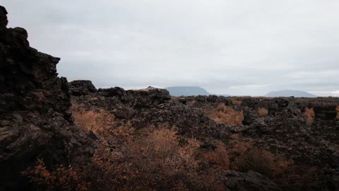 Drone over volcanic rocks and terrain of Dimmuborgir Video stock 166498860