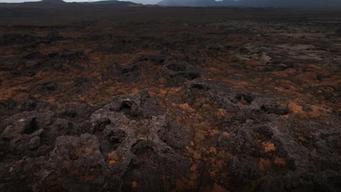 Drone over volcanic rocks and terrain of Dimmuborgir Stock Footage 166499048
