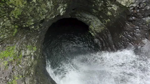 Drone over Waterfall forms into Rock funnel, Australia, QLD, Numinbah Valley Stock Footage 236560580
