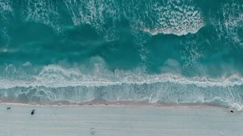 Drone over white sand beach and turquoise ocean waves Stock Footage 332728967