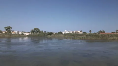 Drone Over Wide Open Calm Lagoon Under Blue Sky, Maristany, Mallorca Stock Footage 340589448