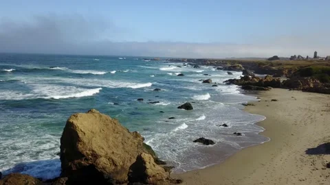 Drone Over Windy California Ocean And Rocky Beach (1 of 3) Stockbeeldmateriaal 166319537