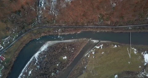 Drone over winter river on the snow shore is very high Stockbeeldmateriaal 123613714