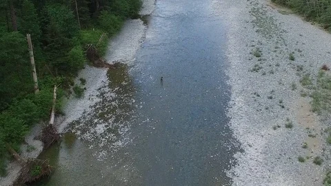 Drone Overhead Man Walking in the River  Video stock 92174767