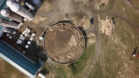 Drone overhead view full orbit quebec dairy farm in spring Stock Footage 93363043