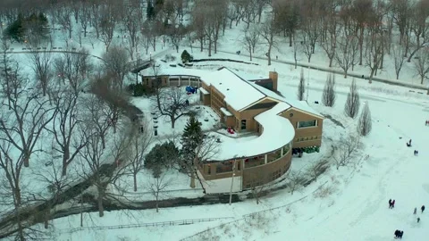 Drone overlooking restaurant robin des bois in park lafointaine montreal Stock Footage 329281782