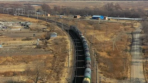 Drone overtakes freight train Stock-Footage 104345637