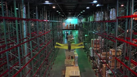 Drone with a package on a board flying inside warehouse. Delivery future concept Video stock 149456713