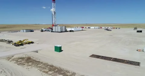 Drone pad overflight fracking operation tractor trailer follow. Stock Footage 167931330