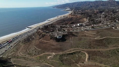 Drone Palisades Fire Destruction of burned down homes and neighborhoods in LA Stock Footage 302700725