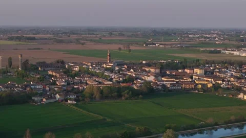 Drone pan above Spinadesco and the Milano-Cremona-Po Canal in the Po Valley Stock Footage 340604205