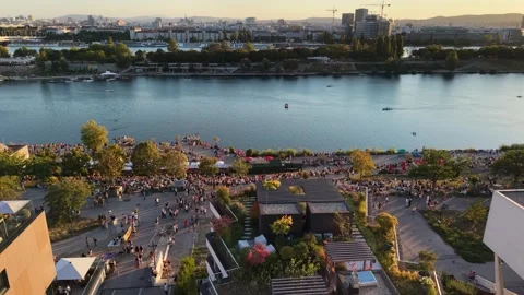 Drone Pan Across New Danube and Copa Beach in Vienna During Partial Solar Stock Footage 342990684