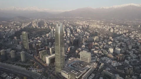 Drone Pan And Tracking Shot Over Santiago Cityscape And Gran Torre Santiago Stock Footage 345606508