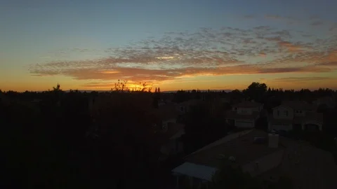 Drone pan up to beautiful sunset Video stock 100565037