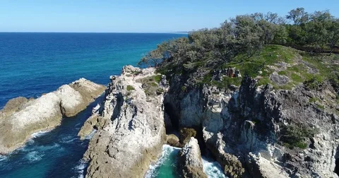 Drone Pan Dramatic Waves on Rocks Stock Footage 78320642