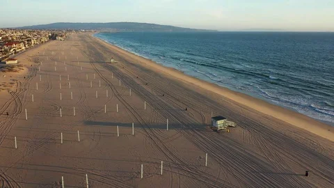 Drone pan of empty California beaches at sunset during Corona Pandemic Video stock 127610183