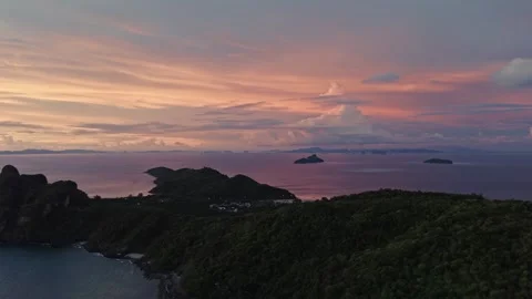 Drone Pan Left Over Phi Phi Islands Coastline at Sunset 動画素材 308354801