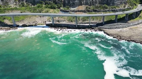 Drone pan left Sea Cliff Bridge Stock Footage 229506872