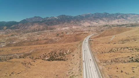 Drone Pan Over Desert Highway Las Vegas Vídeo Stock 325486696