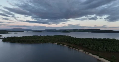 Drone pan over Loch Lomond and Islands at Dusk Stock Footage 213039616