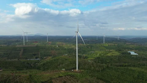 Drone Pan over Wind Farm on Green Hills, Dak Mil, Central Highlands Vietnam 库存影片 329916275