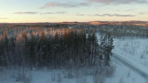 Drone pan over winter landscape in Swedish lapland Stock Footage 150907004