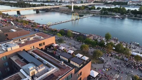 Drone Pan Reveals Huge Eclipse Crowd at Vienna’s Copa Beach Stock Footage 342979166
