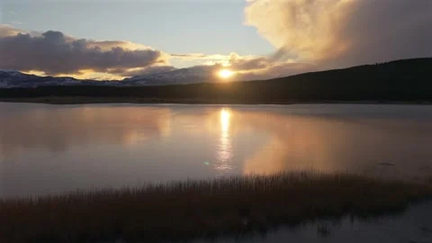 Drone Pan Shot of Sunset Reflection on Laguna La Zeta Argentina Stock Footage 336658417