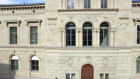 Drone paning close sideways along parliament building in Zug Switzerland Stock Footage 238002816