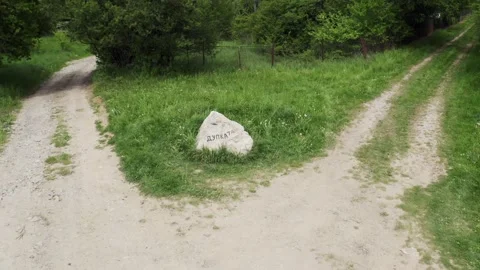 Drone panning from the left to the right over a natural rock landmark in Stock Footage 265990356