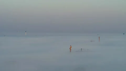 Drone panning over grey thick fog 4K Stock Footage 236723469