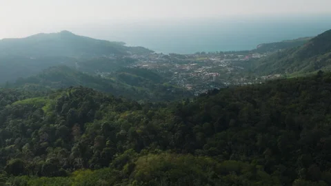 Drone Panning Over Mountain with Sea and City in Phuket Vídeos de archivo 334246491