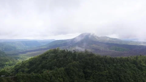Drone panning shot of Mount Batur Stock Footage 304038457