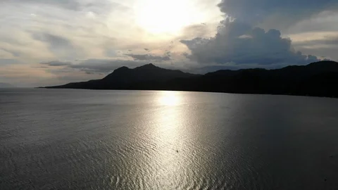 Drone Panning shot mountains and sea Stock Footage