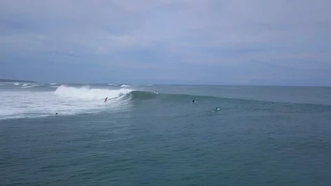Drone Panning Tracking a Surfer in Costa Rica in 4K Stock Footage 93872510