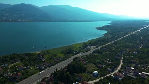 Drone Panorama of Forested Coastline and Blue Sea Stock Footage 342345936