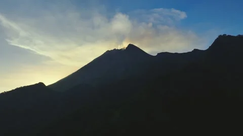 Drone Panorama of Isolated Mountain Peak in Atmospheric Sunrise Stock Footage 341353487