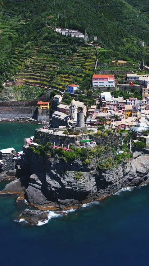 Drone panoramic view of Doria tower and bustling beauty of Vernazza, Cinque T Video stock 345148623