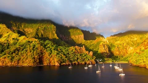 Drone pans across remote anchorage at sunset Stock Footage 308518512
