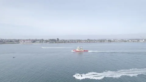 Drone Pans Left Tracking Coast Guard Boat in San Diego, CA. Stock-Footage 206534325