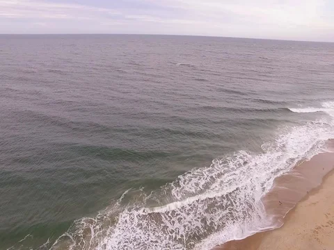 Drone pans over Beach Stock Footage 82574670
