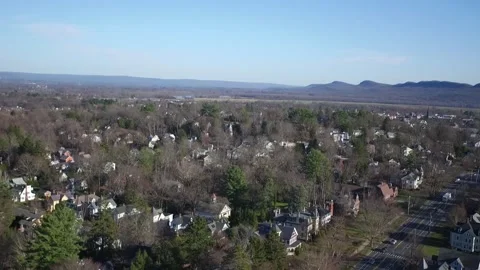 A Drone Pans Right Over A Northampton Neighborhood Stock Footage 329773758