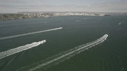 Drone Pans Right Showing Three Boats Sailing in San Diego, CA Stock Footage 206427243