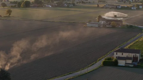 Drone parallax orbit above drought farmland and dust plume in the Po Valley 库存影片 336258172