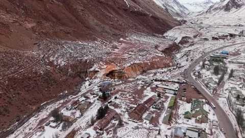 Drone parallax orbit above Puente del Inca geothermal valley in Mendoza Andes Stock Footage 336658488