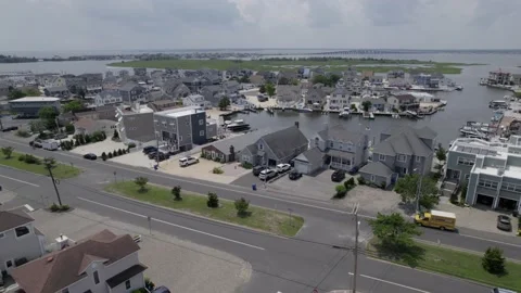 Drone parallax over large beach town many houses Stock Footage 160071647