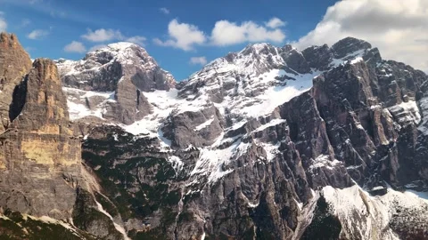 Drone parallax past Torre Trieste spire revealing Civetta north face behind, Stock-Footage 341871509