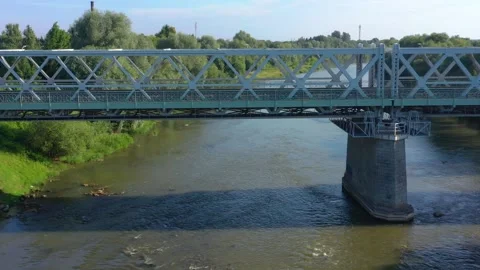 Drone parallel move to the bridge in sundown Video stock 277707677