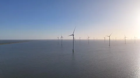Drone pass with Afsluitdijk and offshore wind farm in view Stock Footage 331828364
