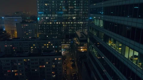 The drone passes by a modern, glazed skyscraper. Stock-Footage 108572368